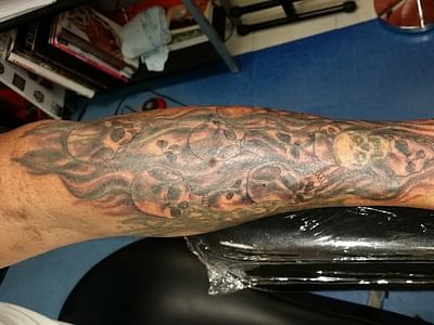 Under Your Skin Tattoo & Body Piercing