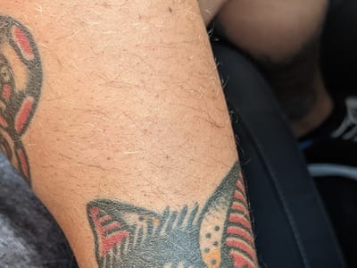 Unite and Win Tattoo