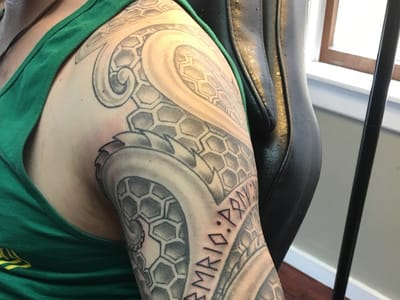 Utopian tattoo and body piercing