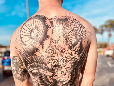 Wolf and Flame Tattoo