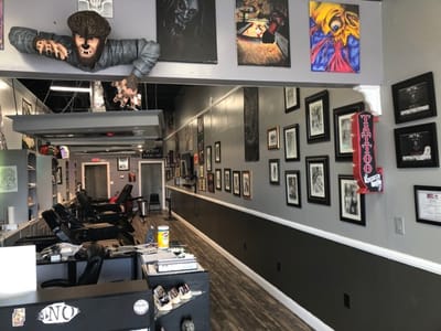 Wolfman Tattoos and Piercings