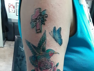 Your Mom's Tattoo Atelier, LLC