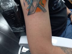 Yours Truly Tattoo, LLC